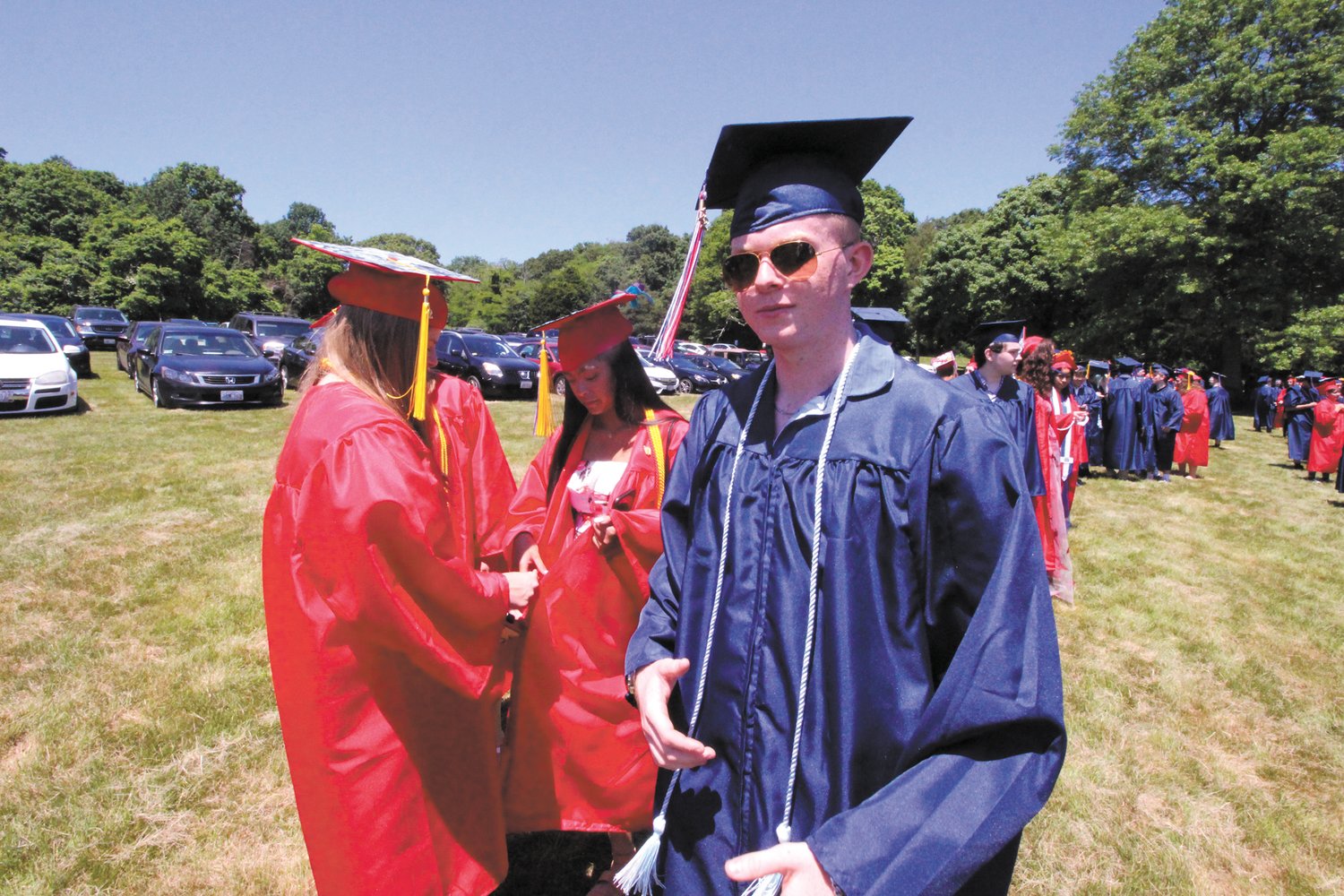 STEPPING INTO THE WORKFORCE: (right) David McCurry, who received a Toll Gate diploma while completing the electrical program at the Warwick Area Career and Technical Center has lined up a position in the repair of HVAC systems. “The trades is where it’s at,” he said while waiting to commencement exercises to start.